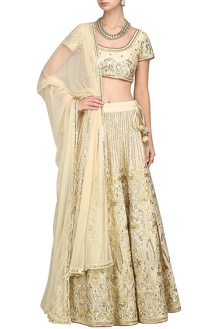 Off white dabka embroidered lehenga set available only at Pernia's Pop Up Shop.