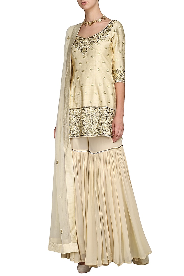 Off white embroidered sharara set available only at Pernia's Pop Up Shop.