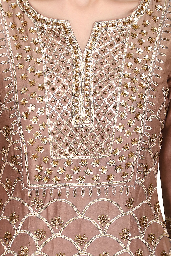 Champagne gold embellished sharara set available only at Pernia's Pop Up Shop.