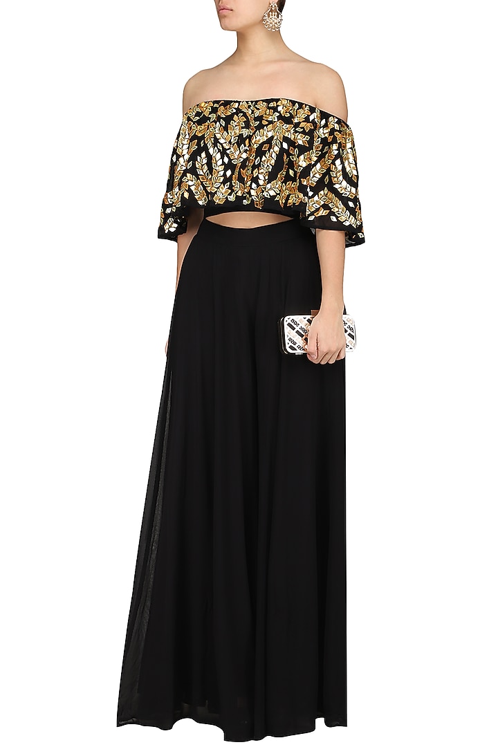 Black embroidered off shoulder blouse with palazzo pants available only at Pernia's Pop Up Shop.