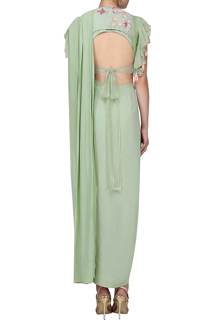 Pista green drape saree with embroidered jacket available only at Pernia's Pop Up Shop.