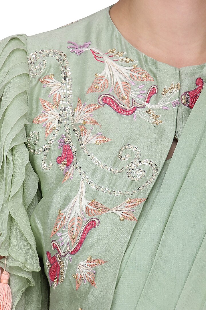 Pista green drape saree with embroidered jacket available only at Pernia's Pop Up Shop.