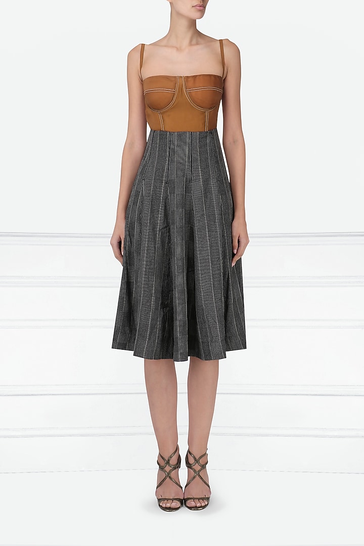 Burnt orange and black dress available only at Pernia's Pop Up Shop.