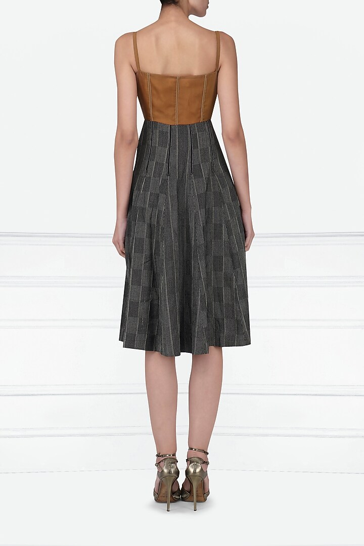 Burnt orange and black dress available only at Pernia's Pop Up Shop.