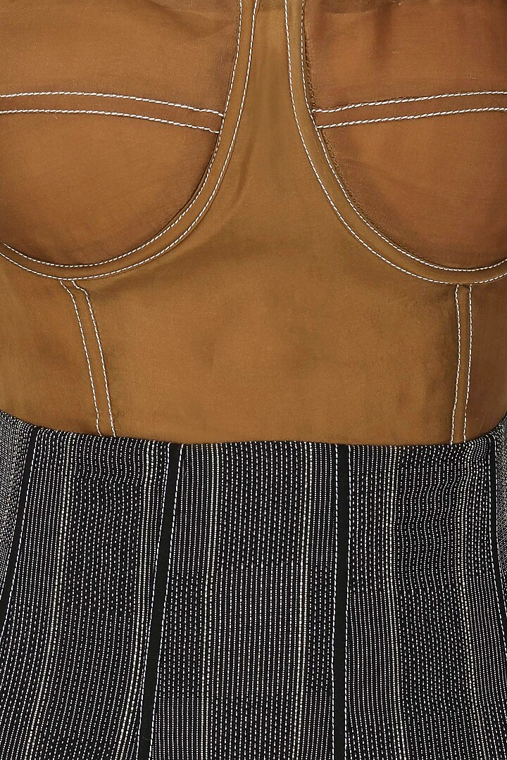 Burnt orange and black dress available only at Pernia's Pop Up Shop.