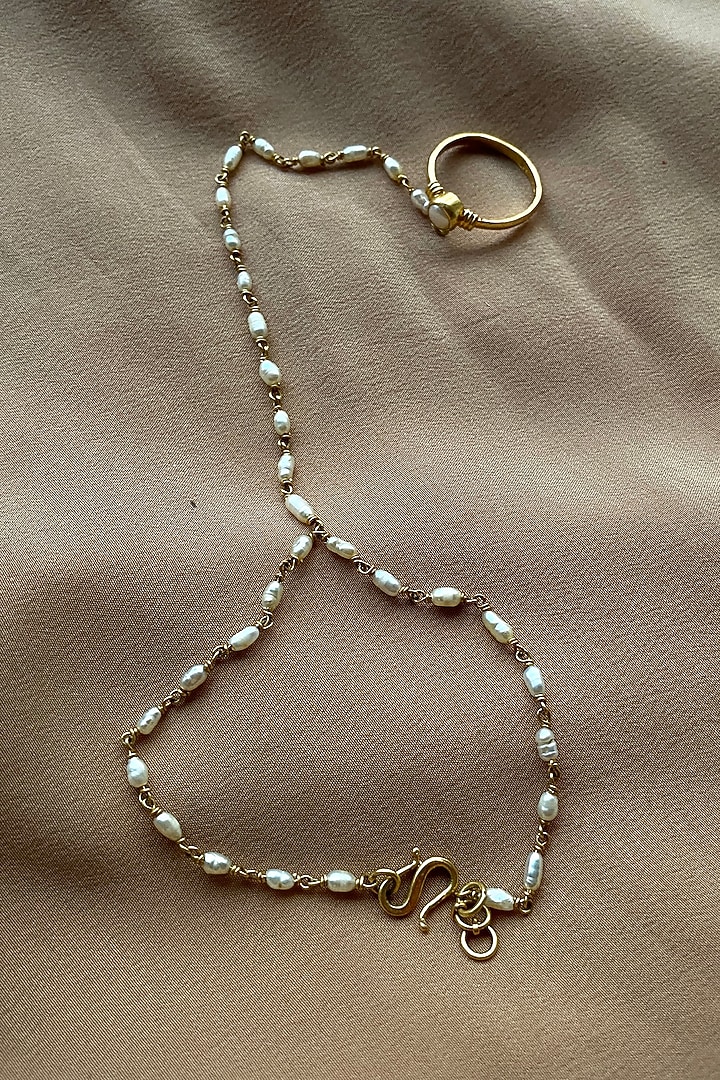 Gold Finish Basra Pearl Hand Harness In Sterling Silver by Eterno India at Pernia's Pop Up Shop