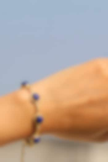 Gold Finish Lapis Lazuli Bracelet In Sterling Silver by Eterno India at Pernia's Pop Up Shop