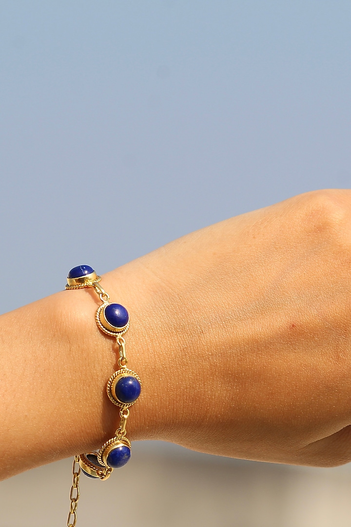 Gold Finish Lapis Lazuli Bracelet In Sterling Silver by Eterno India at Pernia's Pop Up Shop