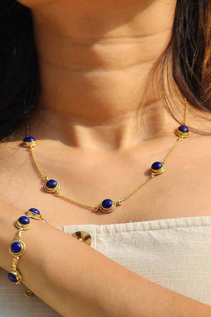 Gold Finish Lapis Lazuli Bracelet In Sterling Silver by Eterno India at Pernia's Pop Up Shop