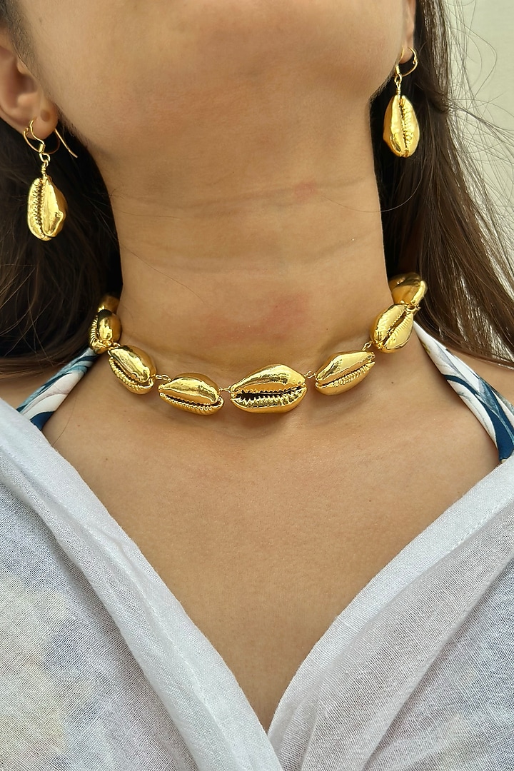 Gold Finish Cowrie Shell Dangler Earrings In Sterling Silver by Eterno India at Pernia's Pop Up Shop