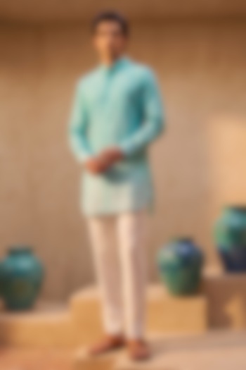 Light Blue Ombre Linen Motifs Embroidered Kurta by Eleven Brothers at Pernia's Pop Up Shop