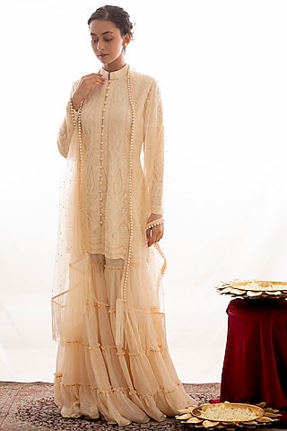 Nude Chikankari Embroidered Sharara Set by EVRA BY NIKITA KHURANA