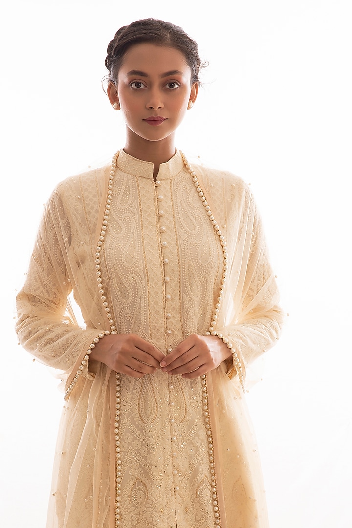 Nude Chikankari Embroidered Party Wear Sharara Set by EVRA BY NIKITA KHURANA at Pernia's Pop Up Shop