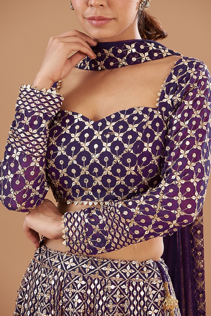 Dark Purple Georgette Embroidered Wedding Lehenga Set by EVRA BY NIKITA KHURANA at Pernia's Pop Up Shop