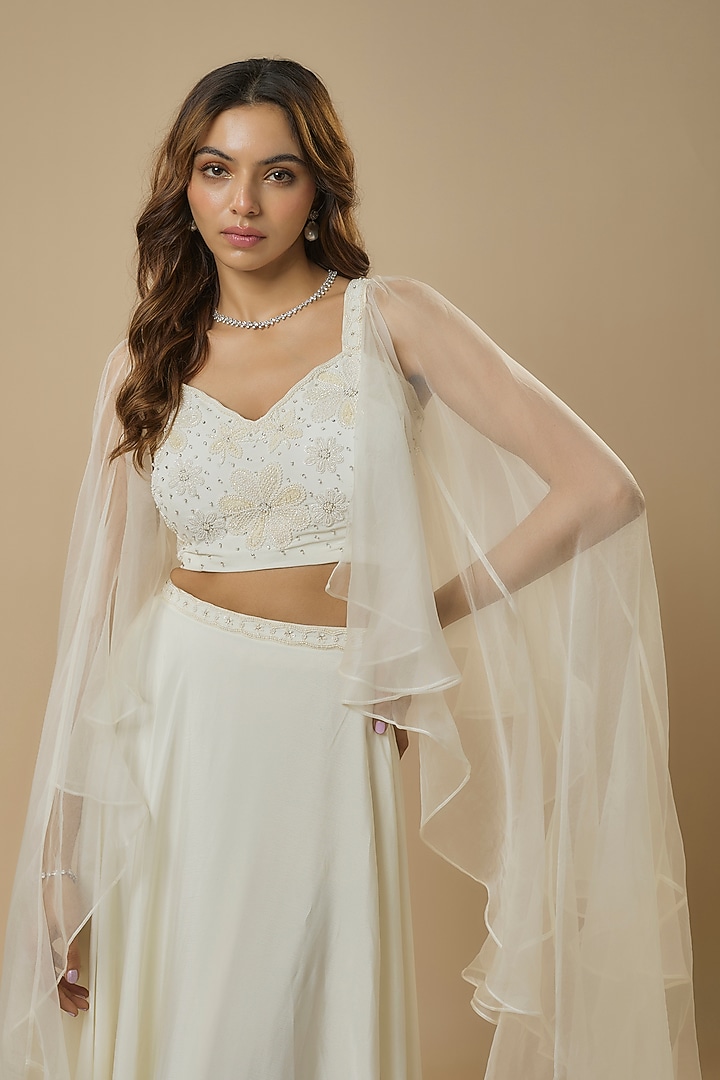Ivory Crepe Embroidered Lehenga Set by Ewoke at Pernia's Pop Up Shop