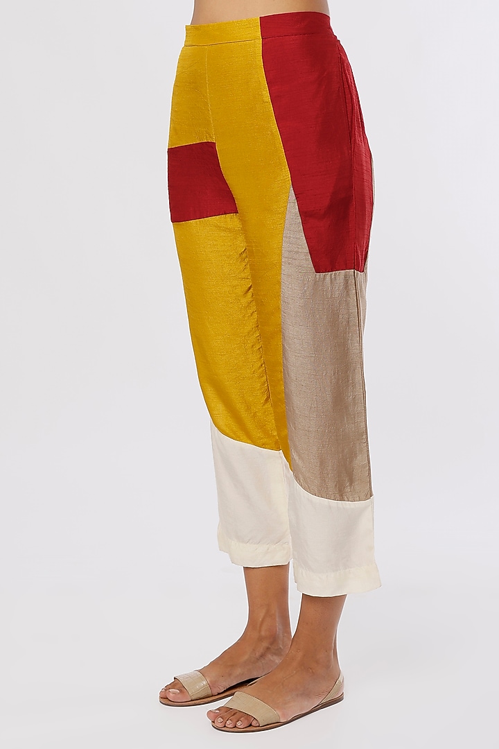 Yellow Dola Silk Cigarette Pants by Ezra at Pernia's Pop Up Shop