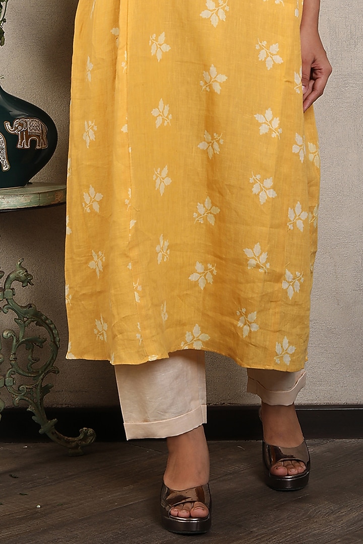 Yellow Gauze Linen Printed & Embroidered Gathered Kurta Set by Falguni.Foram at Pernia's Pop Up Shop