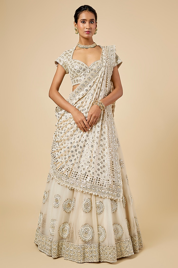 Ivory Net Mukaish Embroidered Bridal Lehenga Set by Faabiiana at Pernia's Pop Up Shop