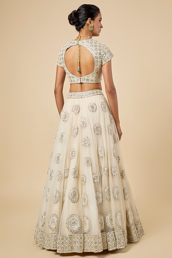 Ivory Net Mukaish Embroidered Bridal Lehenga Set by Faabiiana at Pernia's Pop Up Shop