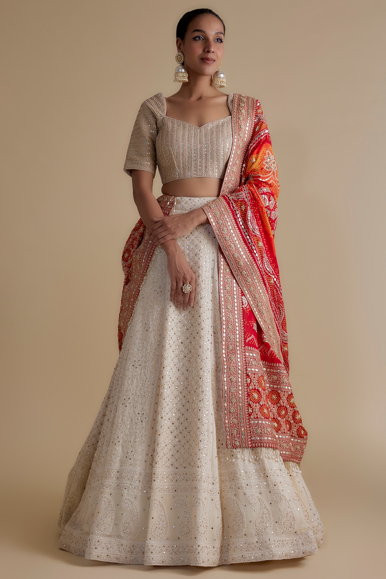 A woman in a white and red lehenga photo – Free Surat Image on Unsplash