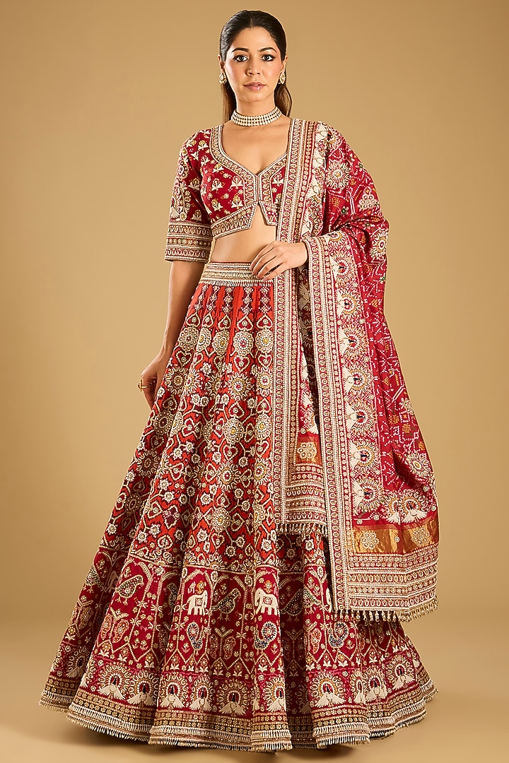 Reddish Pink Patola Bridal Lehenga Set by Faabiiana at Pernia's Pop Up Shop