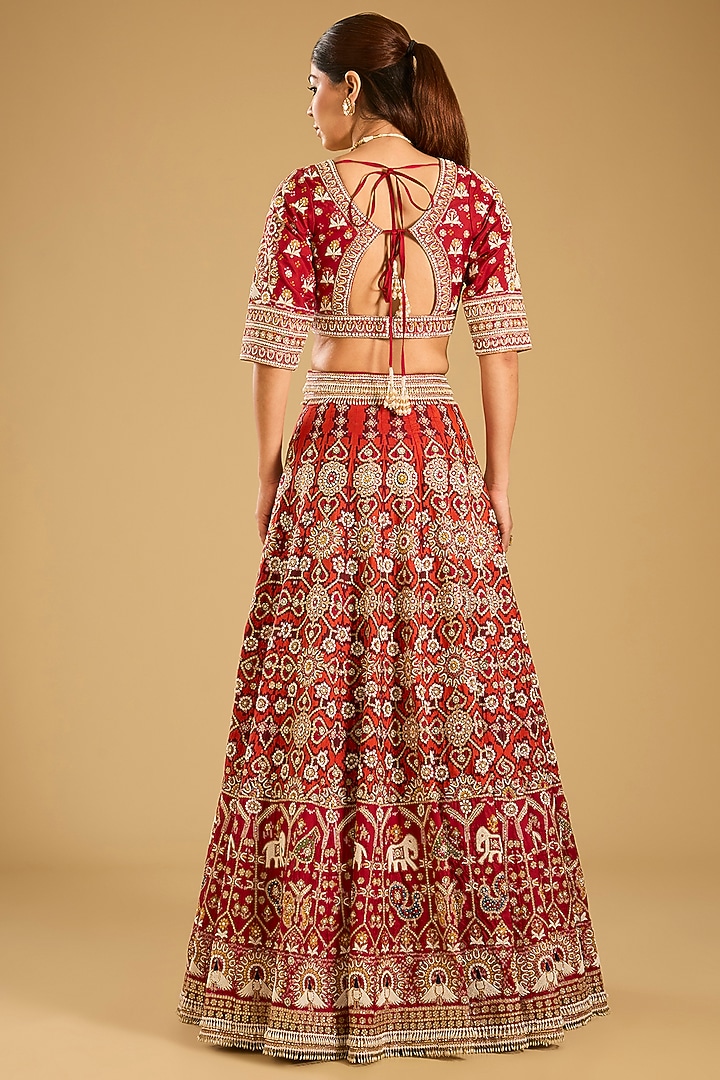 Reddish Pink Patola Bridal Lehenga Set by Faabiiana at Pernia's Pop Up Shop