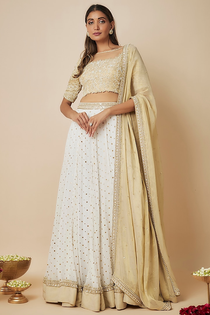 Ivory Georgette Sequins Embellished Wedding Lehenga Set by FATIZ at Pernia's Pop Up Shop