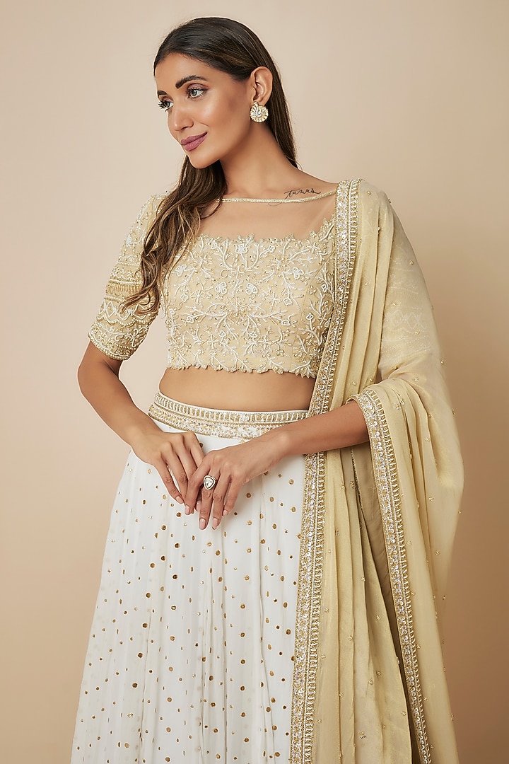 Ivory Georgette Sequins Embellished Wedding Lehenga Set by FATIZ at Pernia's Pop Up Shop
