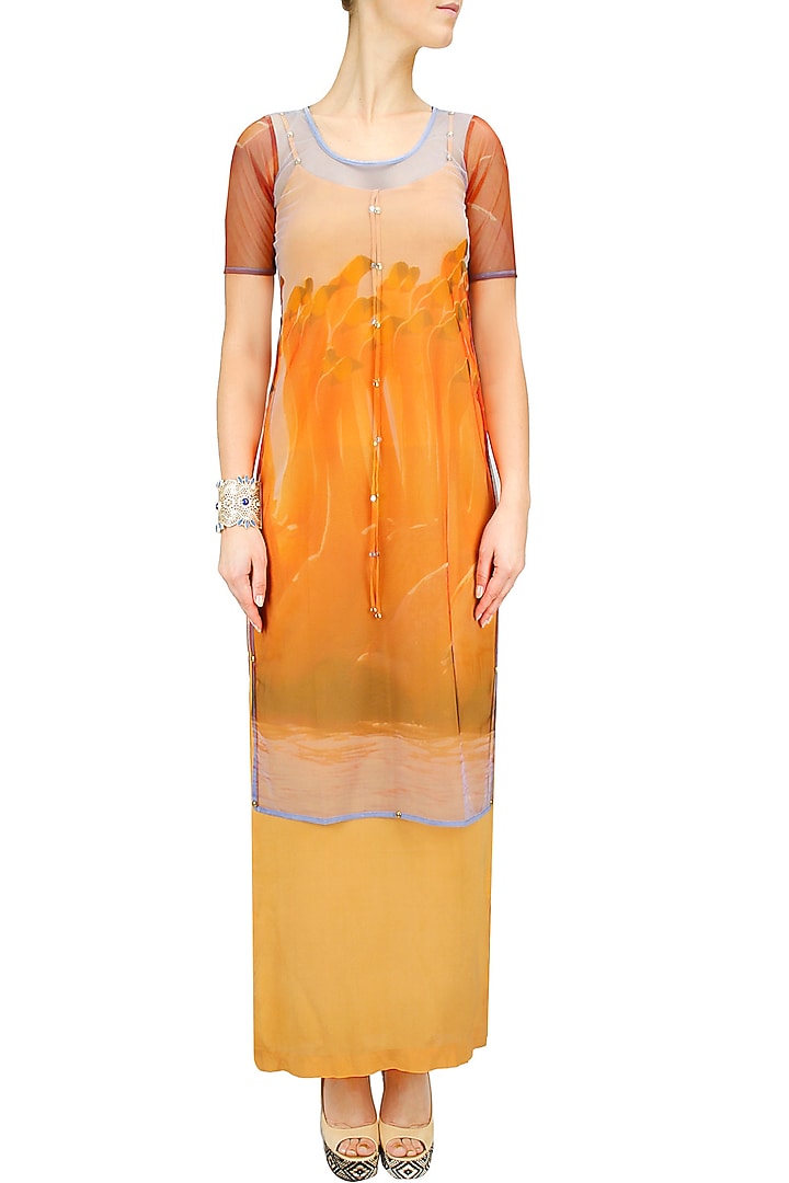 Flamingo print cape with orange slip dress available only at Pernia's Pop-Up Shop.