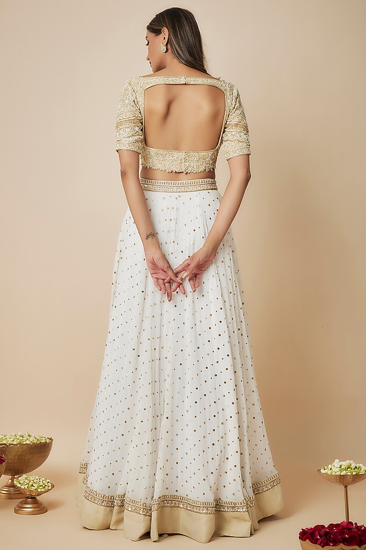Ivory Georgette Sequins Embellished Wedding Lehenga Set by FATIZ at Pernia's Pop Up Shop