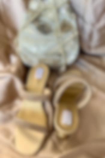 Gold Jute Silk Potli With Sandals by Fuchsia by Aashka Mehta