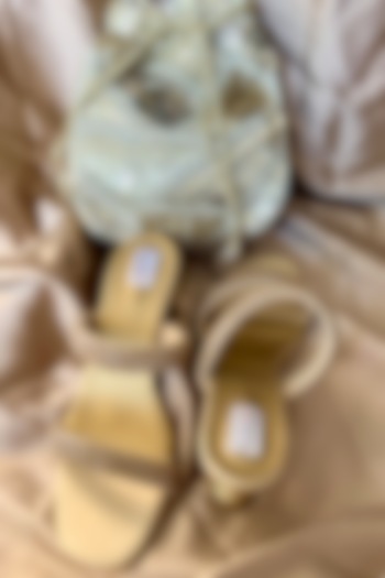 Gold Jute Silk Potli With Sandals by Fuchsia by Aashka Mehta at Pernia's Pop Up Shop