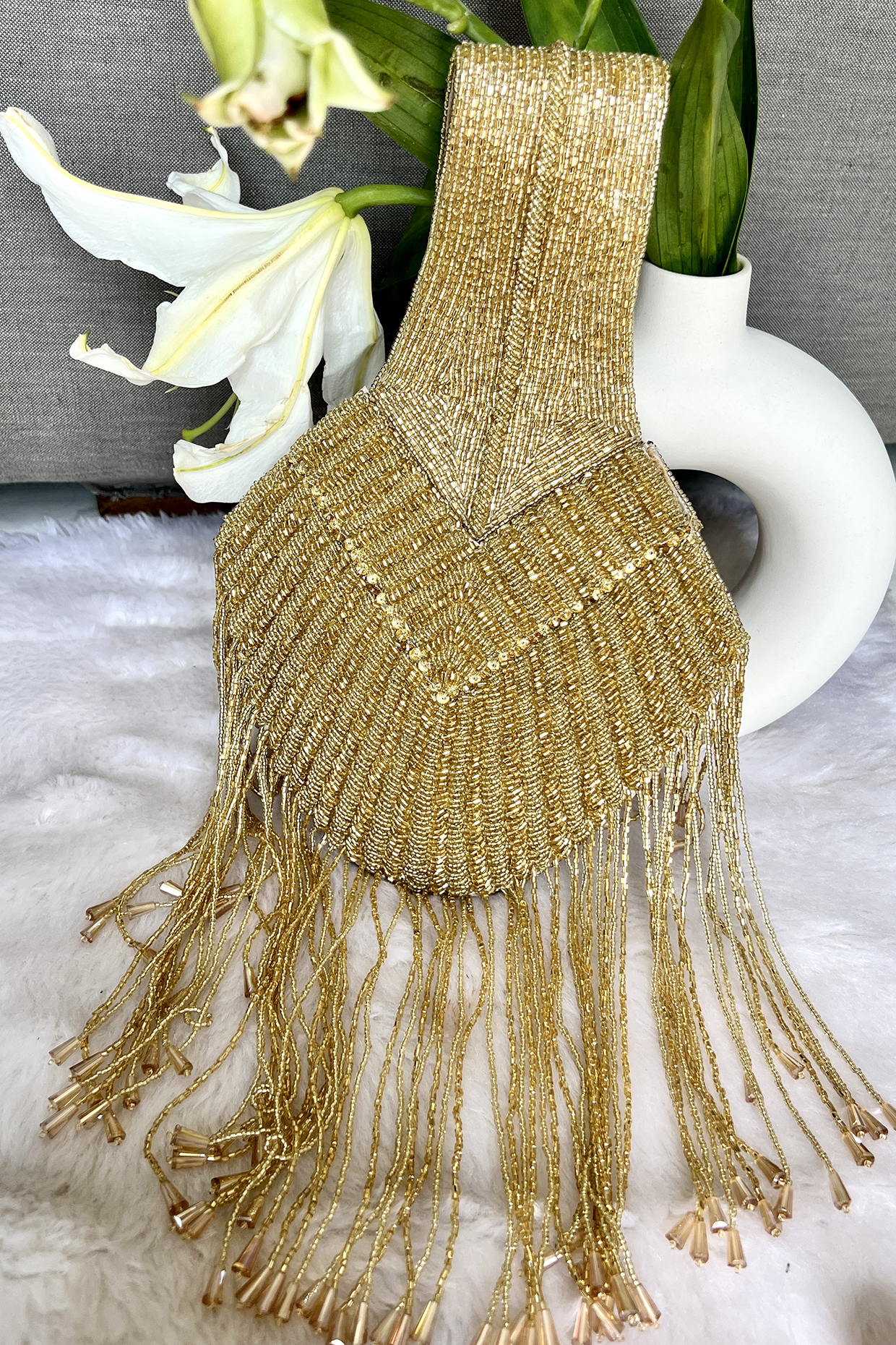Gold Silk Embellished Potli by Fuchsia by Aashka Mehta at Pernia's Pop Up Shop