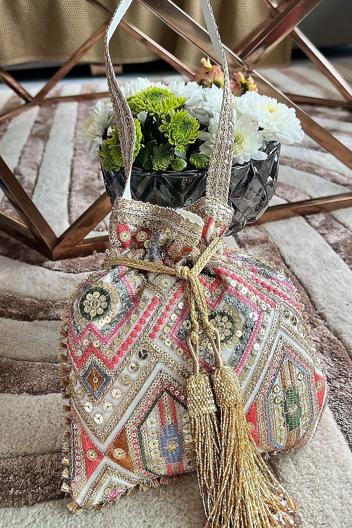 Ivory Silk Thread Embroidered Potli Bag by Fuchsia by Aashka Mehta at Pernia's Pop Up Shop