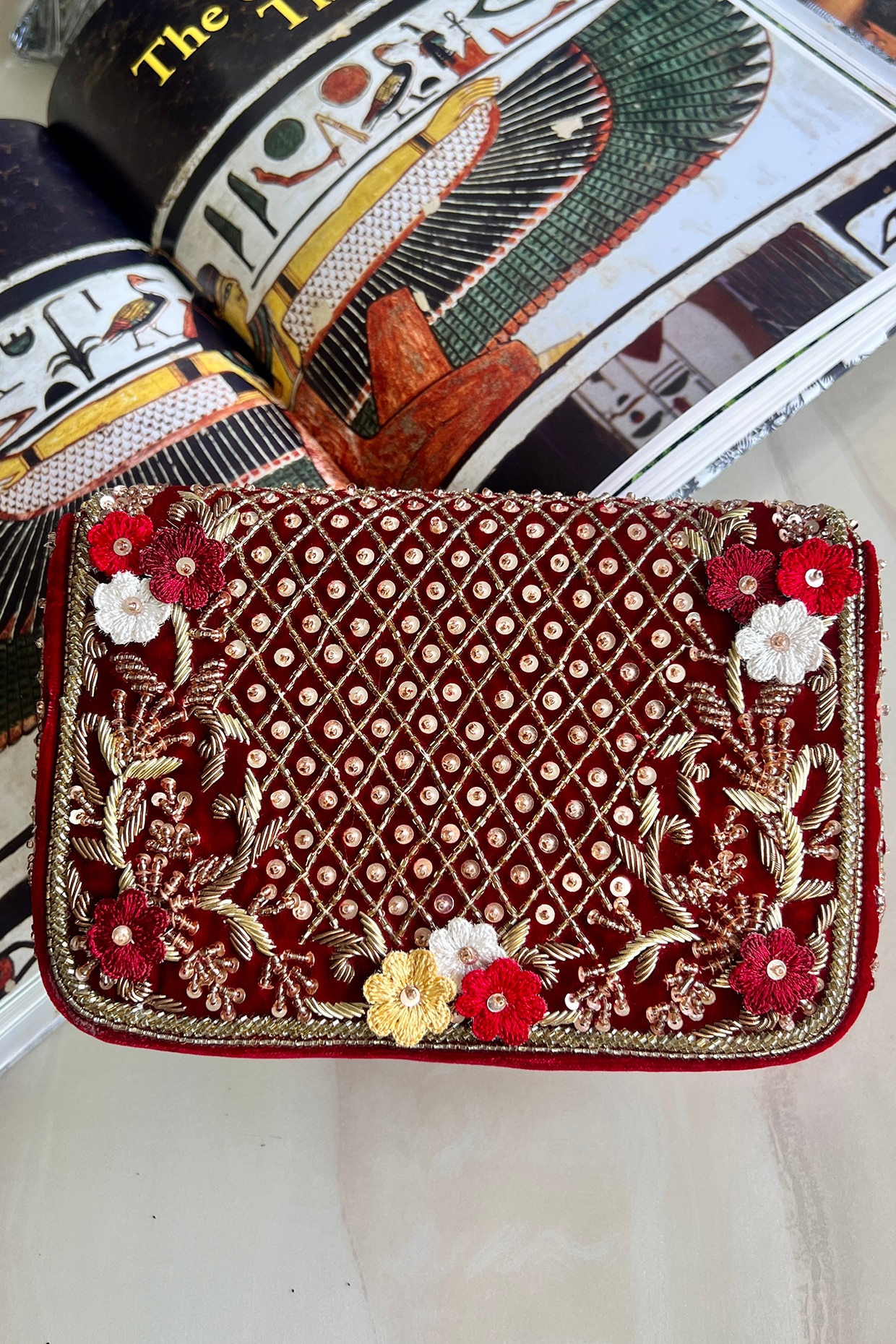 Embroidered on sale clutch bag