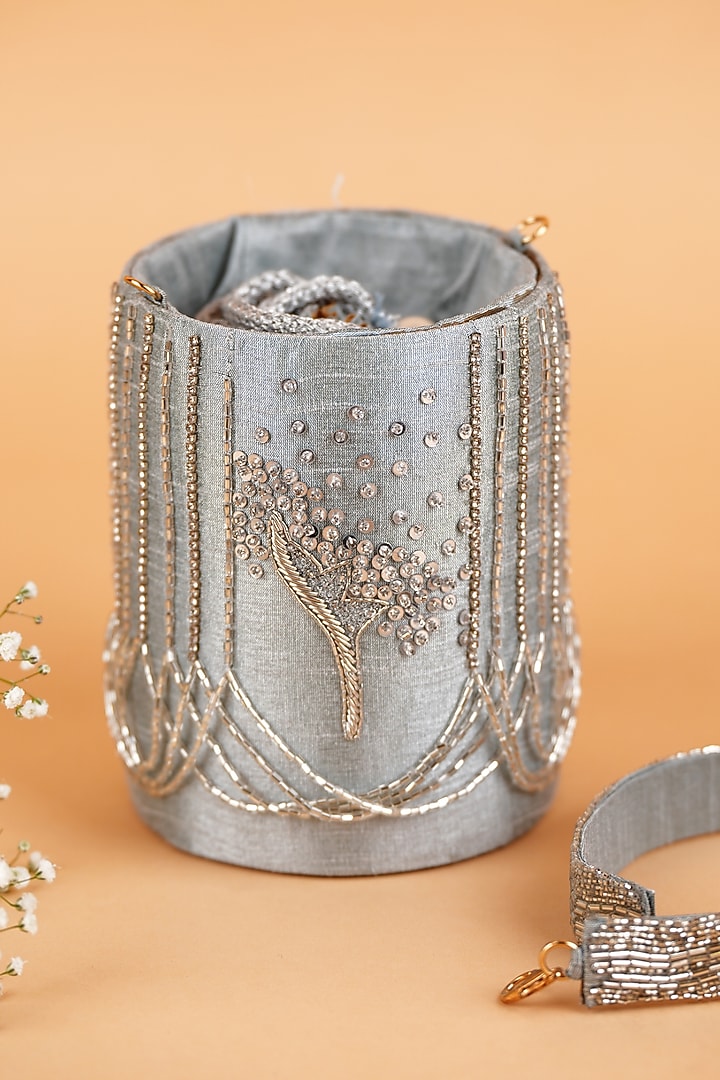 Silver Semi-Raw Silk Hand Embroidered Potli by Feza Bags at Pernia's Pop Up Shop