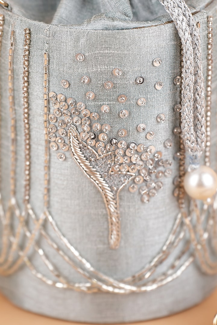 Silver Semi-Raw Silk Hand Embroidered Potli by Feza Bags at Pernia's Pop Up Shop
