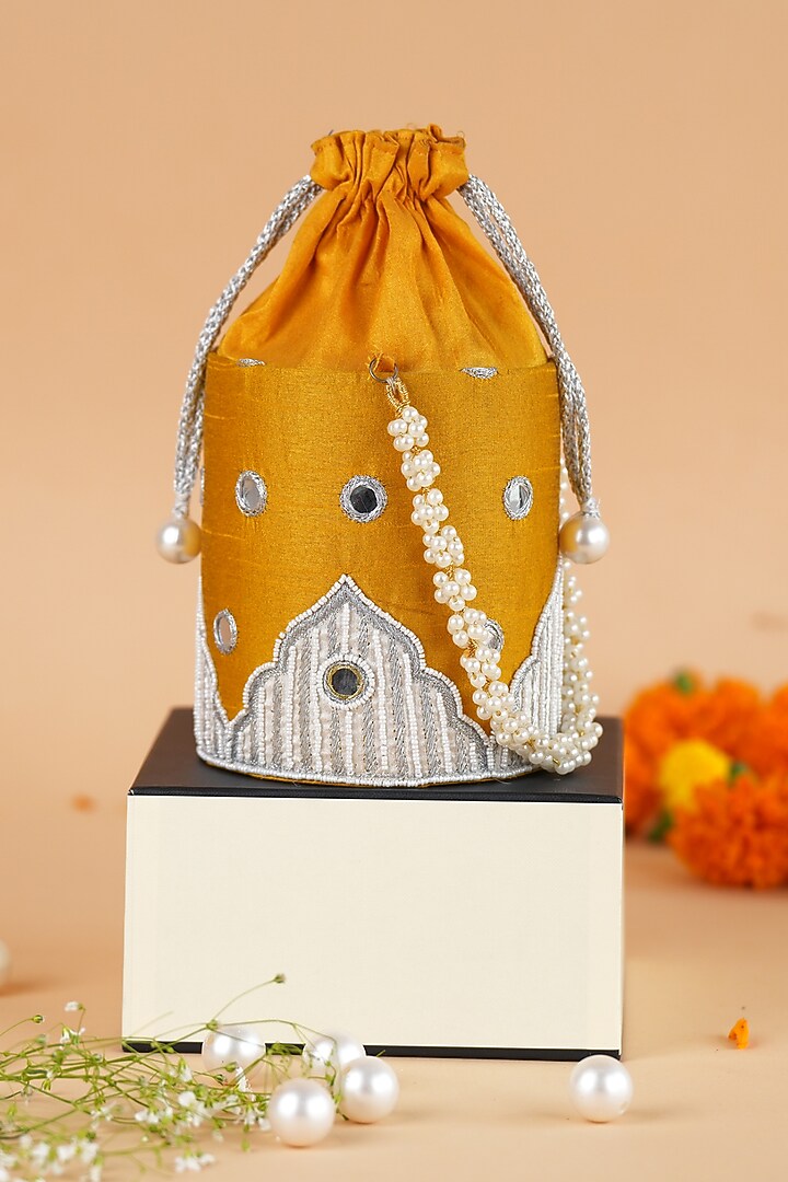 Yellow Semi-Raw Silk Potli by Feza Bags at Pernia's Pop Up Shop