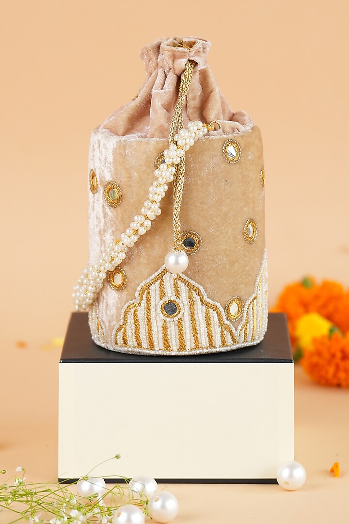 Gold Velvet Potli by Feza Bags at Pernia's Pop Up Shop