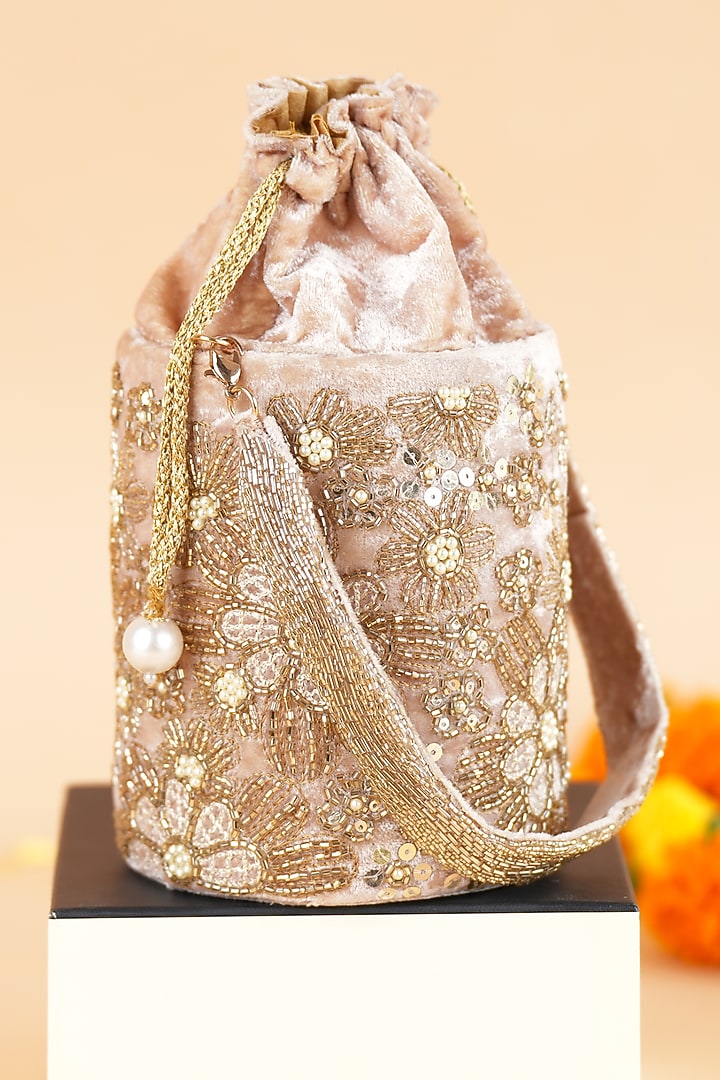 Gold Velvet Potli by Feza Bags at Pernia's Pop Up Shop