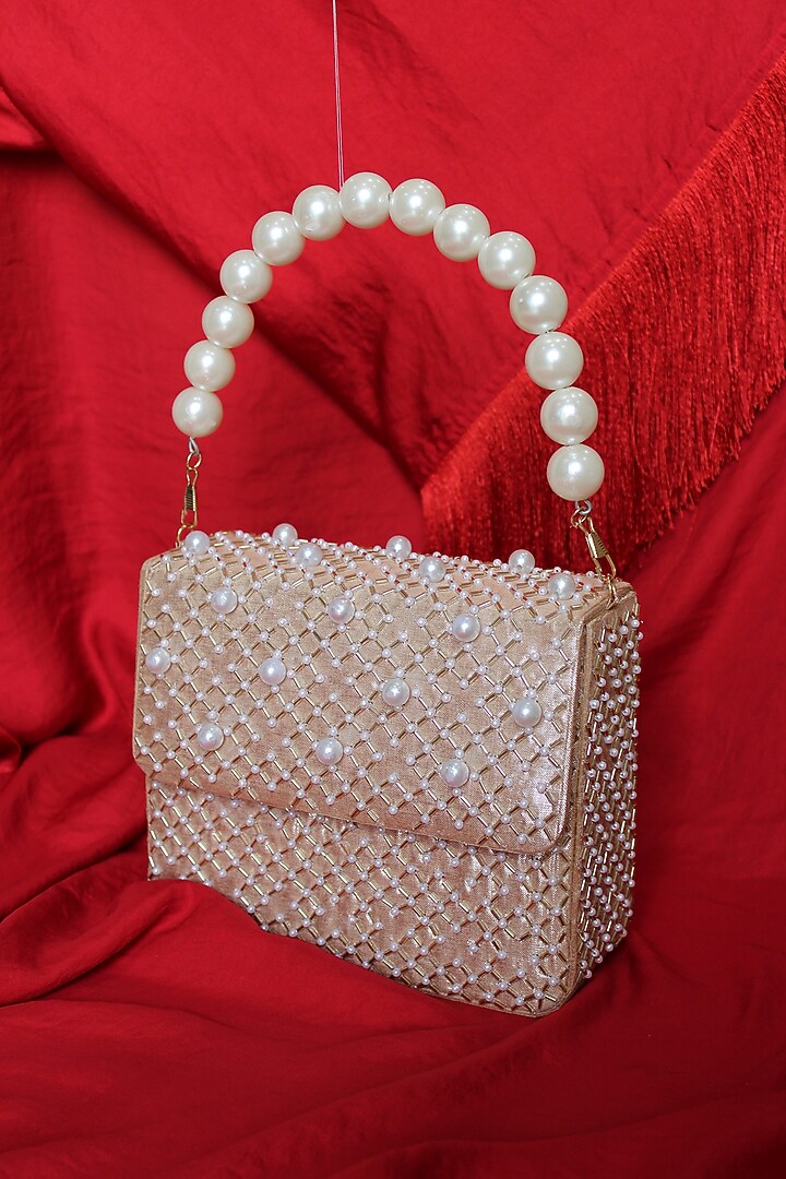 Gold Imported Shimmer Clutch by Feza Bags at Pernia's Pop Up Shop
