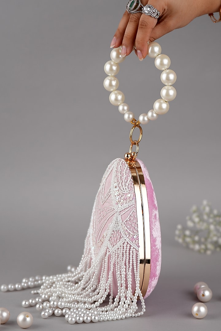 Pink Velvet & Semi-Raw Silk Clutch by Feza Bags at Pernia's Pop Up Shop