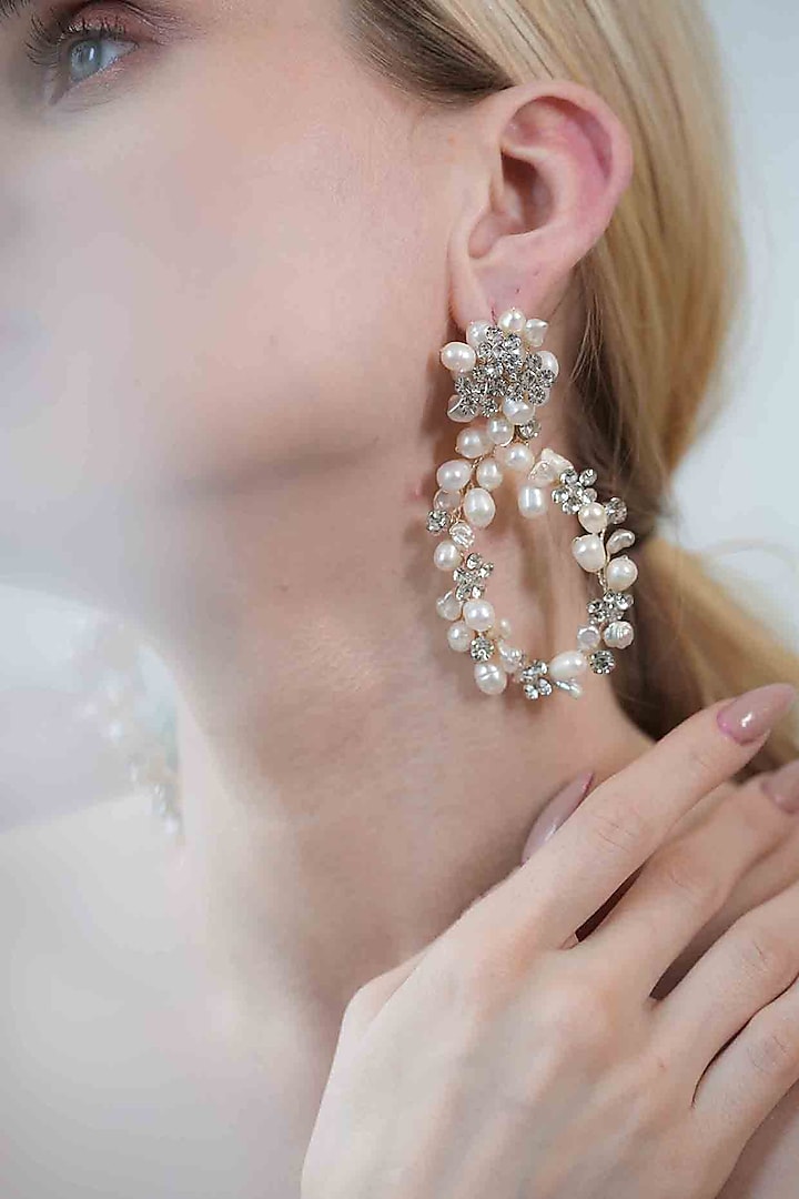 White Pearl Dangler Earrings by FLORISTAA BY MAHEK