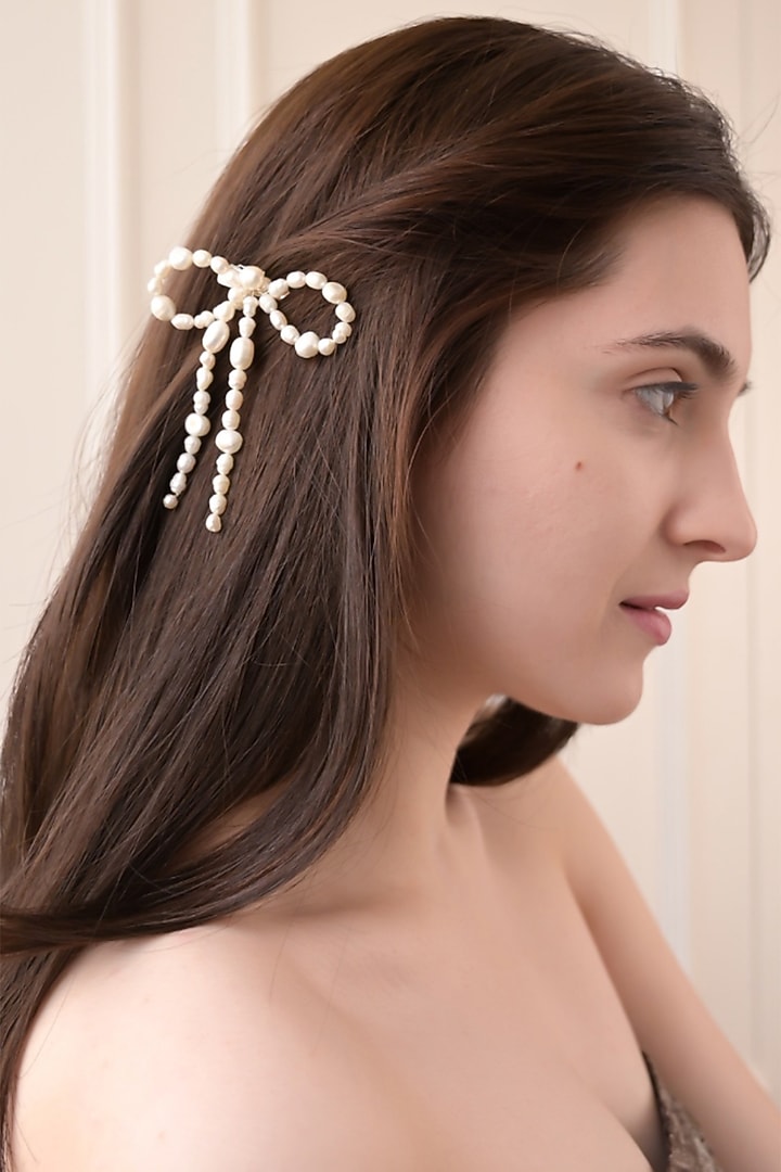 White Handcrafted Pearl Hair Bow (Set of 2) by FLORISTAA BY MAHEK at Pernia's Pop Up Shop