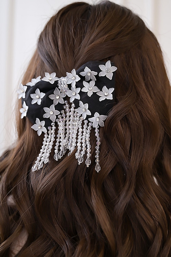 Black Crafted Dangler Hair Bow by FLORISTAA BY MAHEK at Pernia's Pop Up Shop