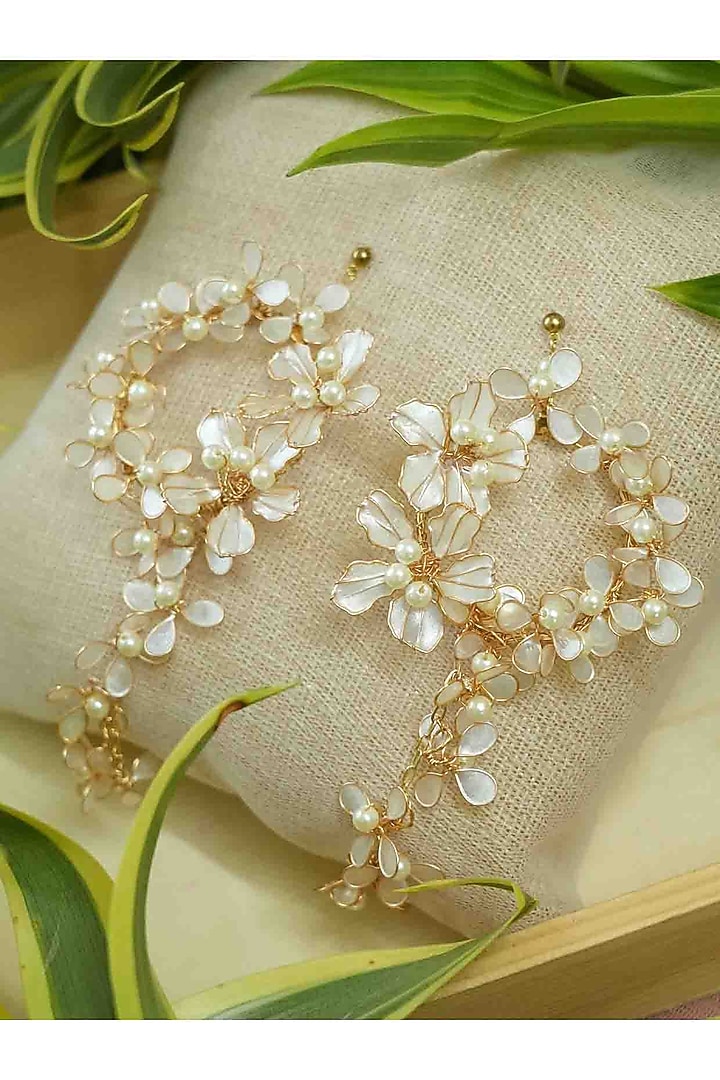 Gold Finish Off-White Gemstone & Resin Floral Earrings by FLORISTAA BY MAHEK at Pernia's Pop Up Shop