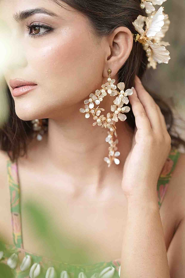 Gold Finish Off-White Gemstone & Resin Floral Earrings by FLORISTAA BY MAHEK at Pernia's Pop Up Shop