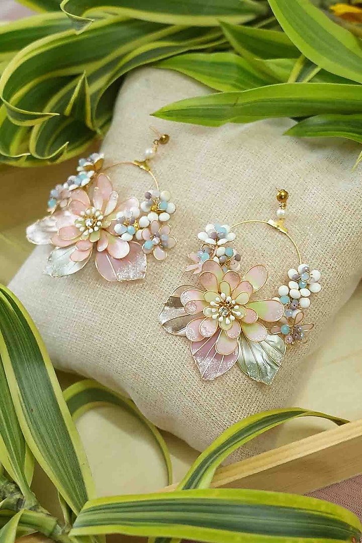 Gold Finish White Gemstone & Resin Floral Earrings by FLORISTAA BY MAHEK at Pernia's Pop Up Shop