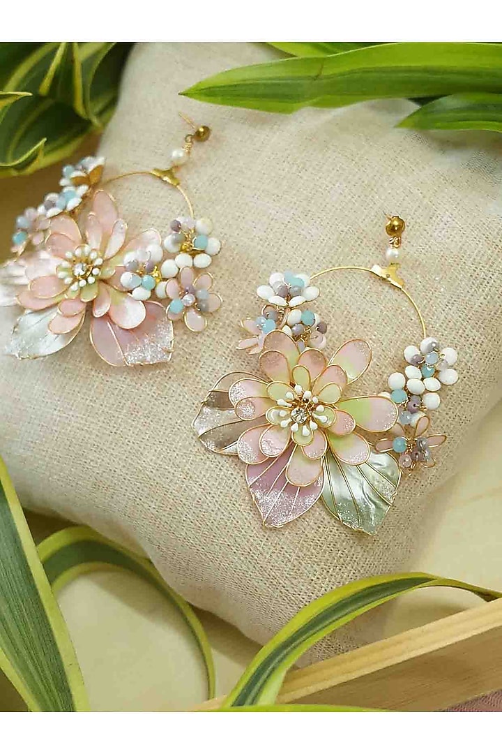 Gold Finish White Gemstone & Resin Floral Earrings by FLORISTAA BY MAHEK at Pernia's Pop Up Shop