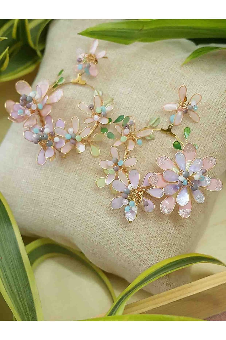 Gold Finish White Gemstone & Resin Floral Earrings by FLORISTAA BY MAHEK at Pernia's Pop Up Shop
